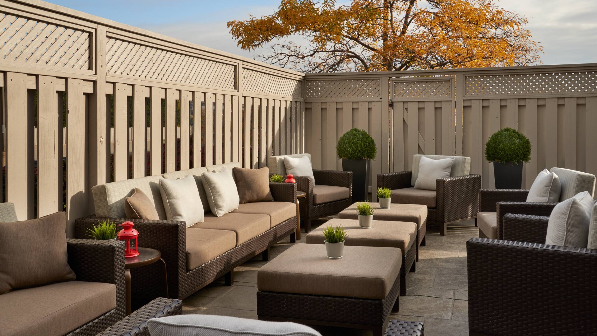 Outdoor patio with lounge sitting at Courtyard By Marriott Toronto Airport.
