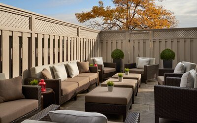 Outdoor patio with lounge sitting at Courtyard By Marriott Toronto Airport.