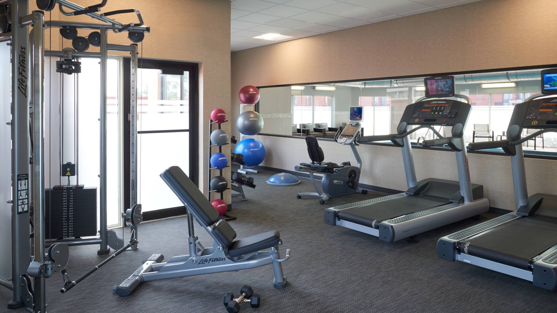 Fully equipped fitness center at Courtyard By Marriott Toronto Airport.