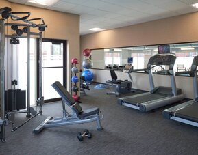 Fully equipped fitness center at Courtyard By Marriott Toronto Airport.