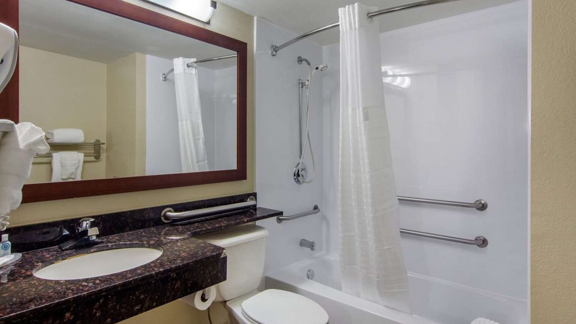 Guest bathroom with shower and tub at Comfort Inn Sandy Springs - Perimeter.