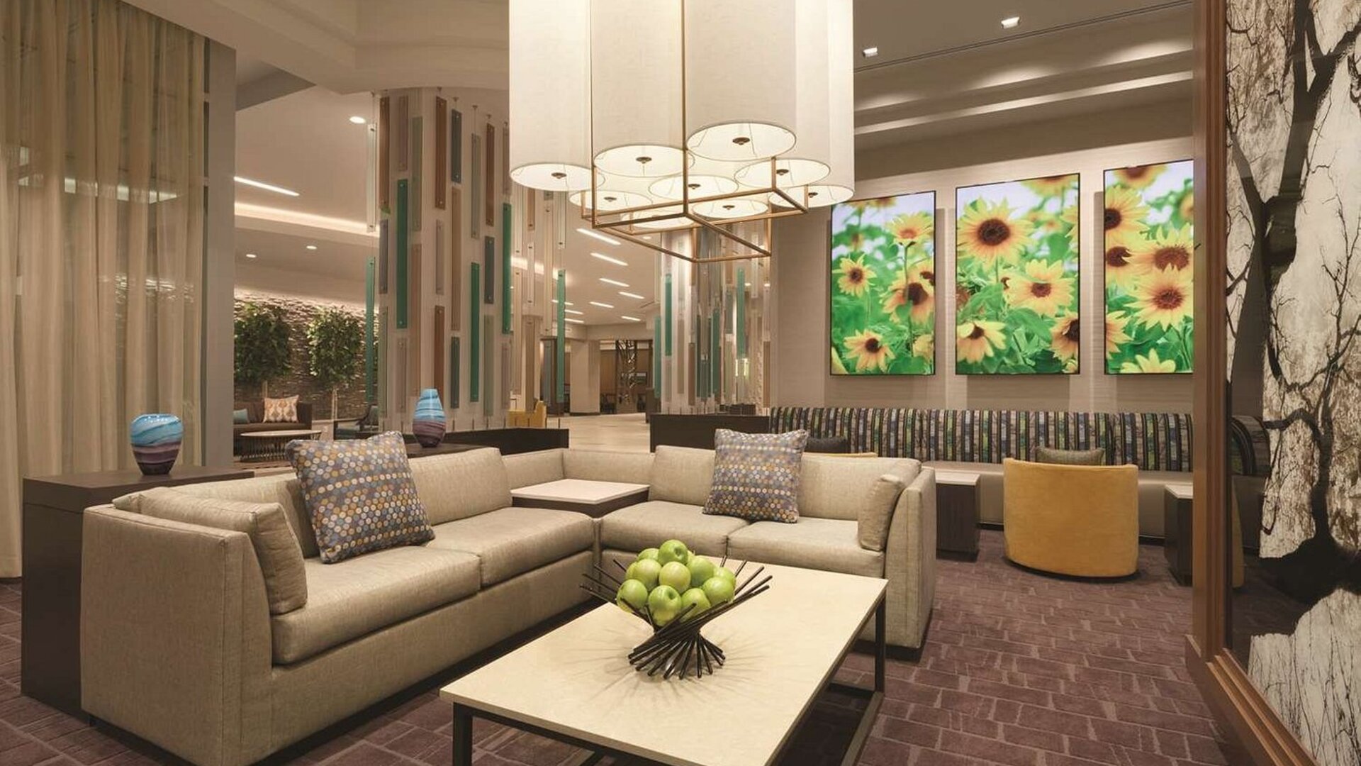 Lobby and coworking lounge at Hyatt Place West End Georgetown.