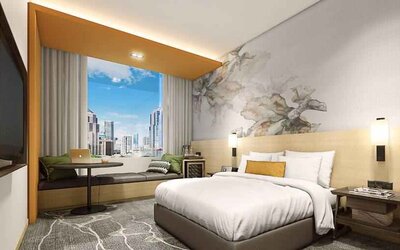 King bedroom with window and view at the Hilton Garden Inn Kuala Lumpur Jalan Tuanku Abdul Rahman North.