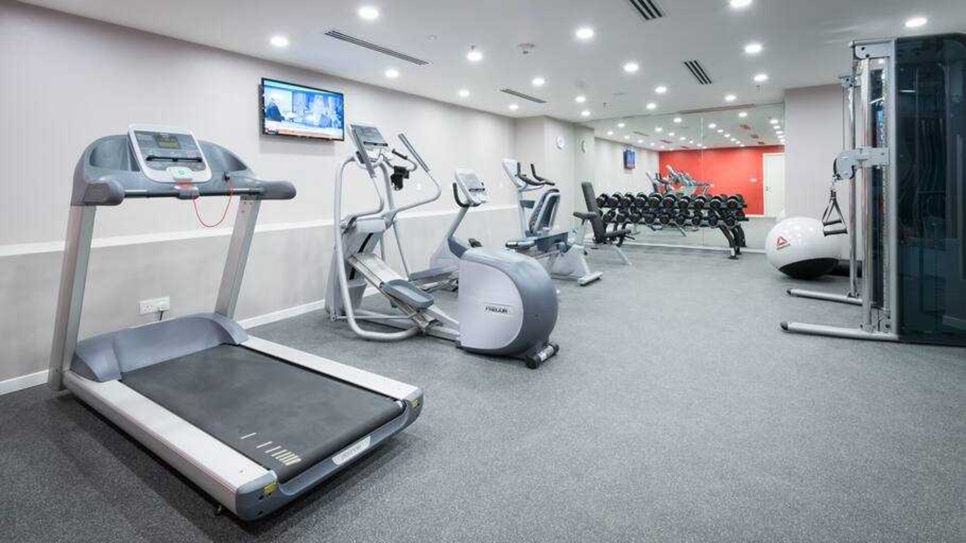 Fitness center with treadmill, exercising bike and weights at the Hilton Garden Inn Kuala Lumpur Jalan Tuanku Abdul Rahman North.