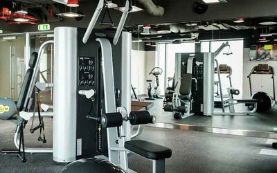 Fully equipped fitness center at the Hampton by Hilton Dubai Al Seef.