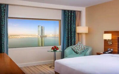 Bright queen room with amazing creek view at the Hilton Ras Al Khaimah Beach Resort.