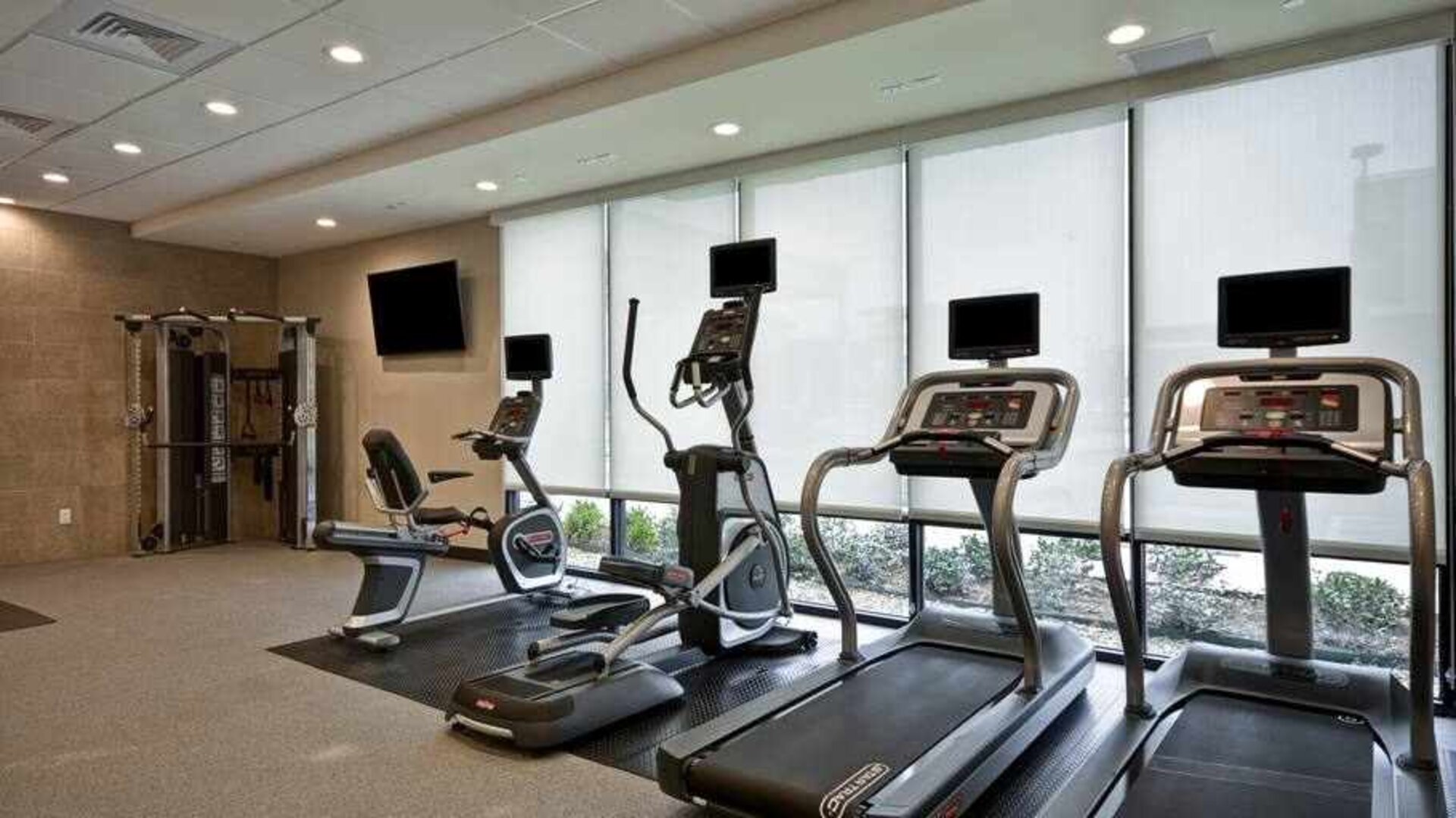Fully equipped gym with treadmills at the Home2 Suites by Hilton Fairview/Allen.