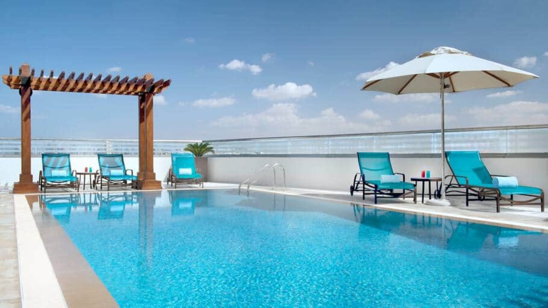 Beautiful outdoor pool at the Hilton Garden Inn Dubai Al Muraqabat