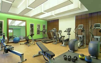 Fully equipped gym at the Hilton Garden Inn Dubai Al Muraqabat