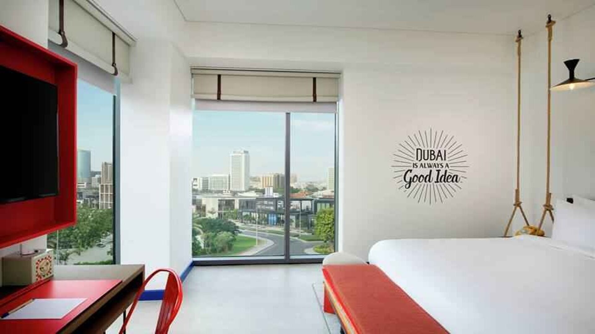 Bright king room with city view at the Hampton by Hilton Dubai Al Seef.