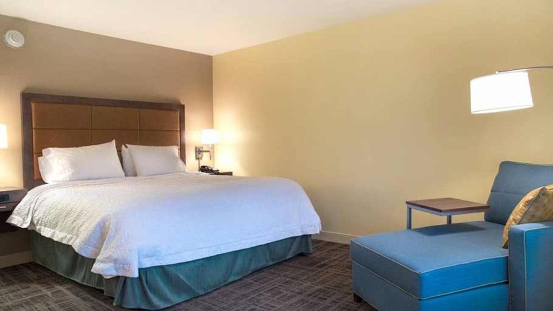 Spacious king room with workspace at Hampton Inn Big Rapids, MI.