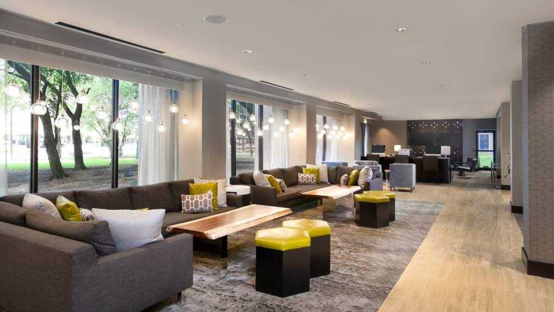 Comfortable lobby lounges at the DoubleTree Suites by Hilton Houston by the Galleria.