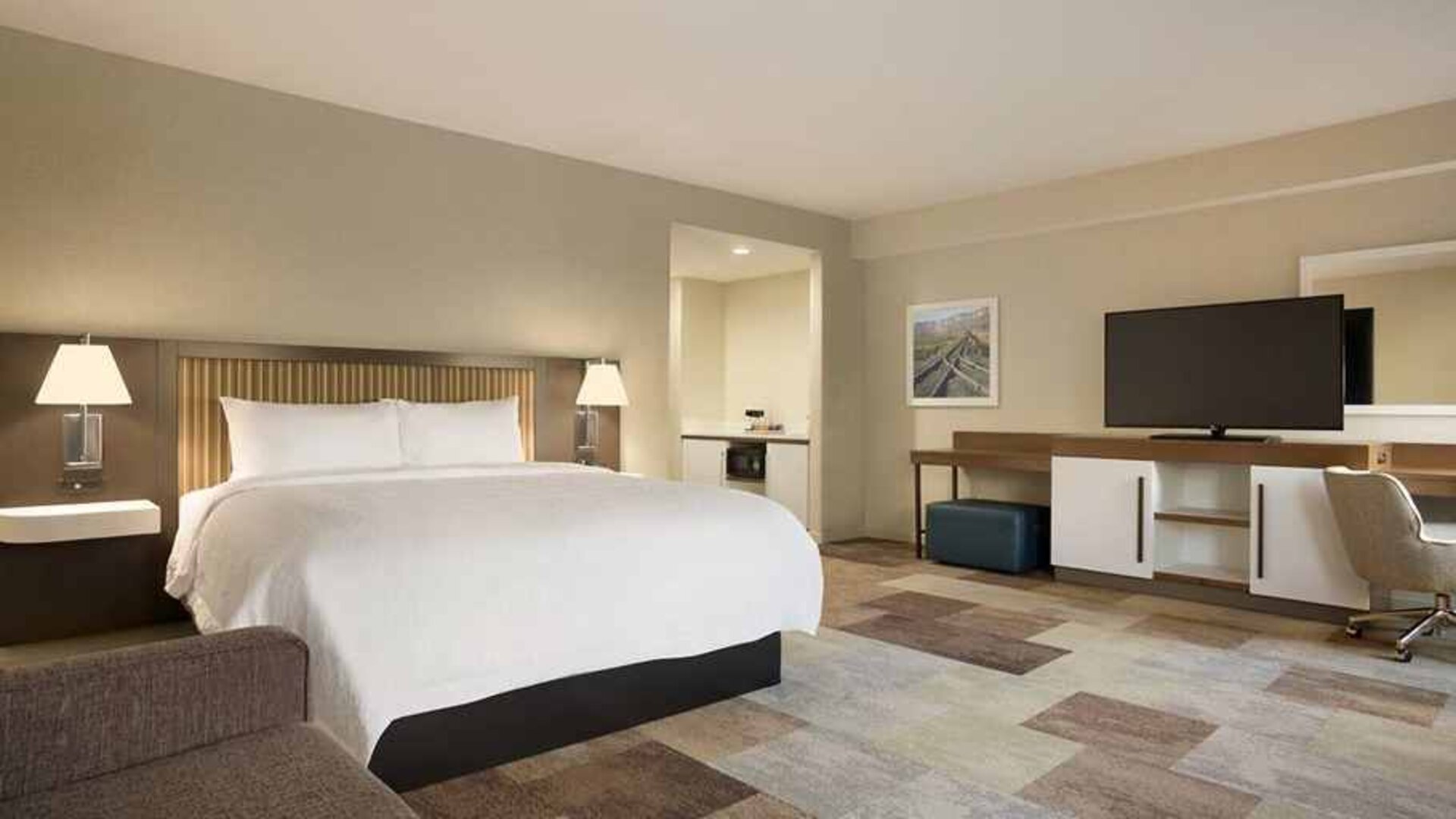 Comfortable king suite with work area at Hampton Inn By Hilton, Salt Lake City Cottonwood.