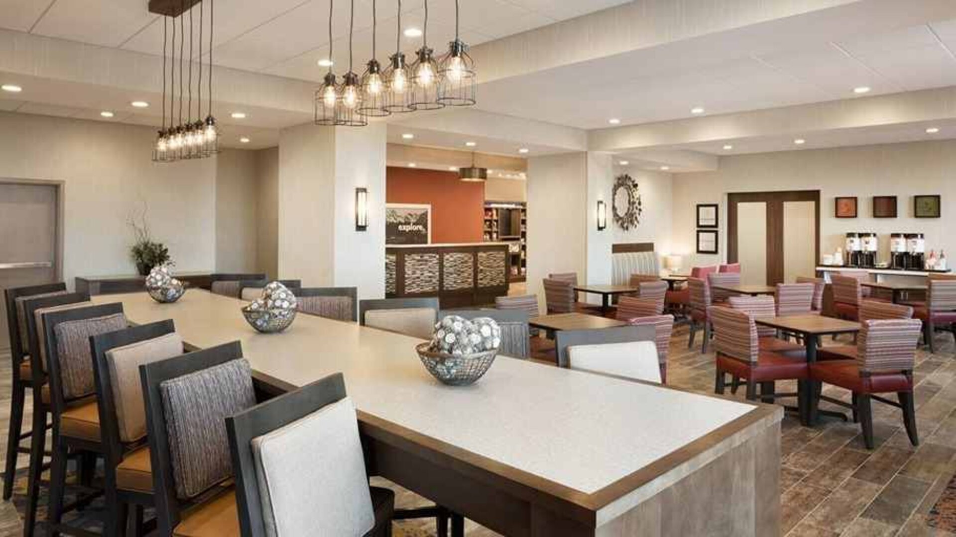 Bright-lit lobby and coworking space at Hampton Inn By Hilton, Salt Lake City Cottonwood.