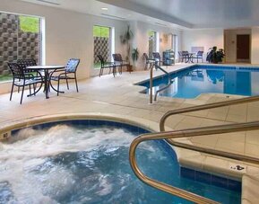 Relaxing indoor pool area with whirlpool at the Hilton Garden Inn Clarksburg.