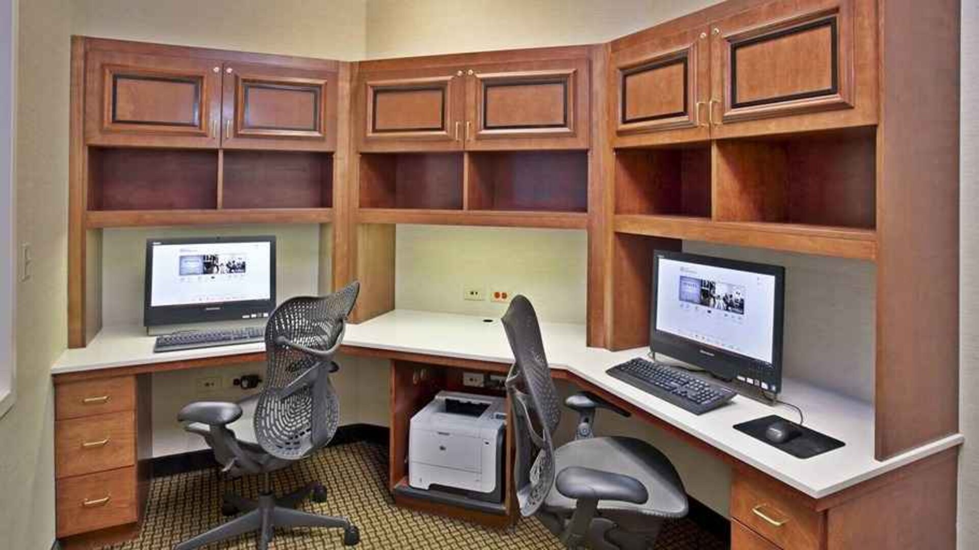 Equipped and professional business center and work station with computer and printer at Hilton Garden Inn Chicago/Midway Airport.