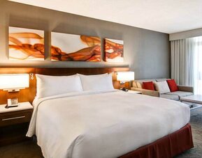 Day use room with lounge area and private bathroom at Hilton Mississauga Meadowvale.