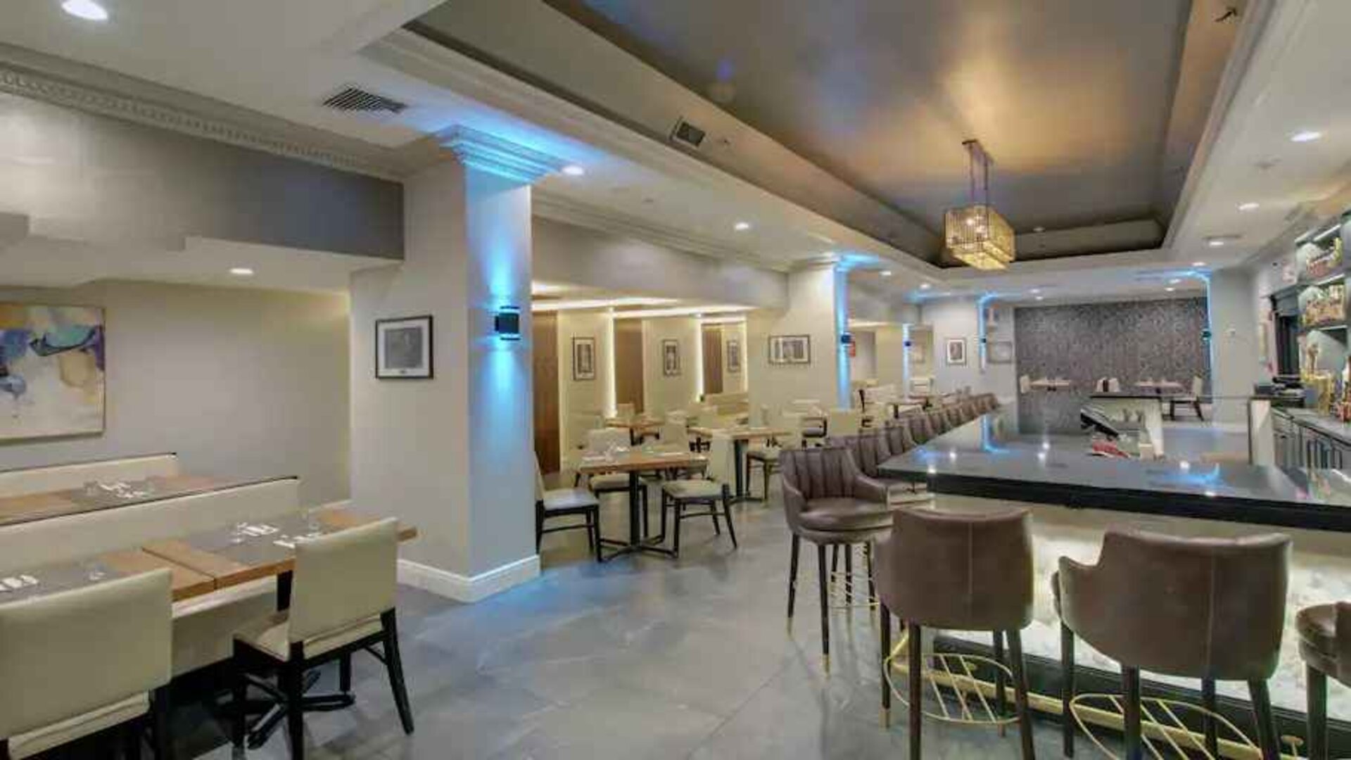 Elegant dining area perfect as workspace at the The Roslyn, Tapestry Collection by Hilton.