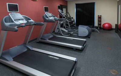 Fitness center with treadmills at the Hilton Garden Inn Tallahassee Central.