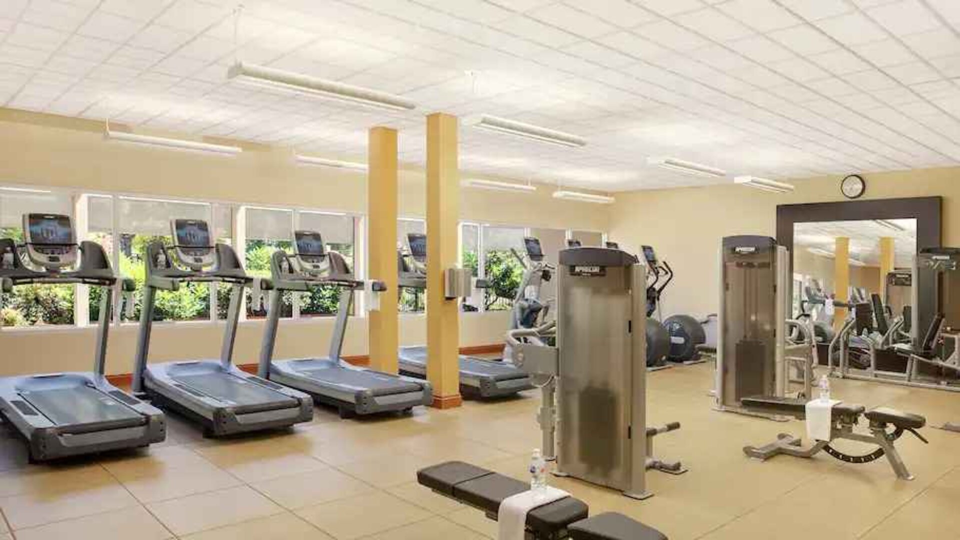 Fitness center with treadmills and machines at the Hilton Seattle Airport & Conference Center.