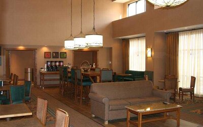 Comfortable lobby area perfect as workplace at the Hampton Inn & Suites Riverton, WY.