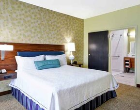 Comfortable king room with work desk at Home2 Suites by Hilton Fort Worth Southwest Cityview.