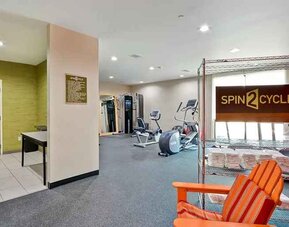 well-equipped fitness center and cycle studio at Home2 Suites by Hilton Fort Worth Southwest Cityview.