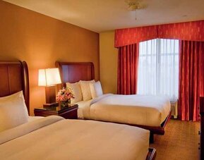 luxurious queen room with TV at Homewood Suites by Hilton Rockville-Gaithersburg.