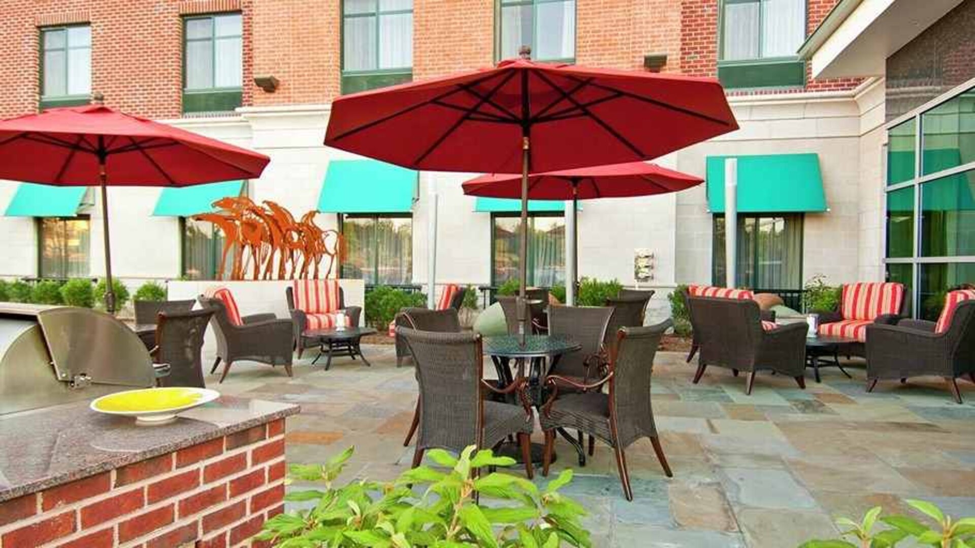 lovely outdoor garden patio for relaxing or coworking at Homewood Suites by Hilton Rockville-Gaithersburg.