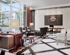 Spacious workspace in a hotel lobby at the Hampton Inn Chicago McCormick Place.