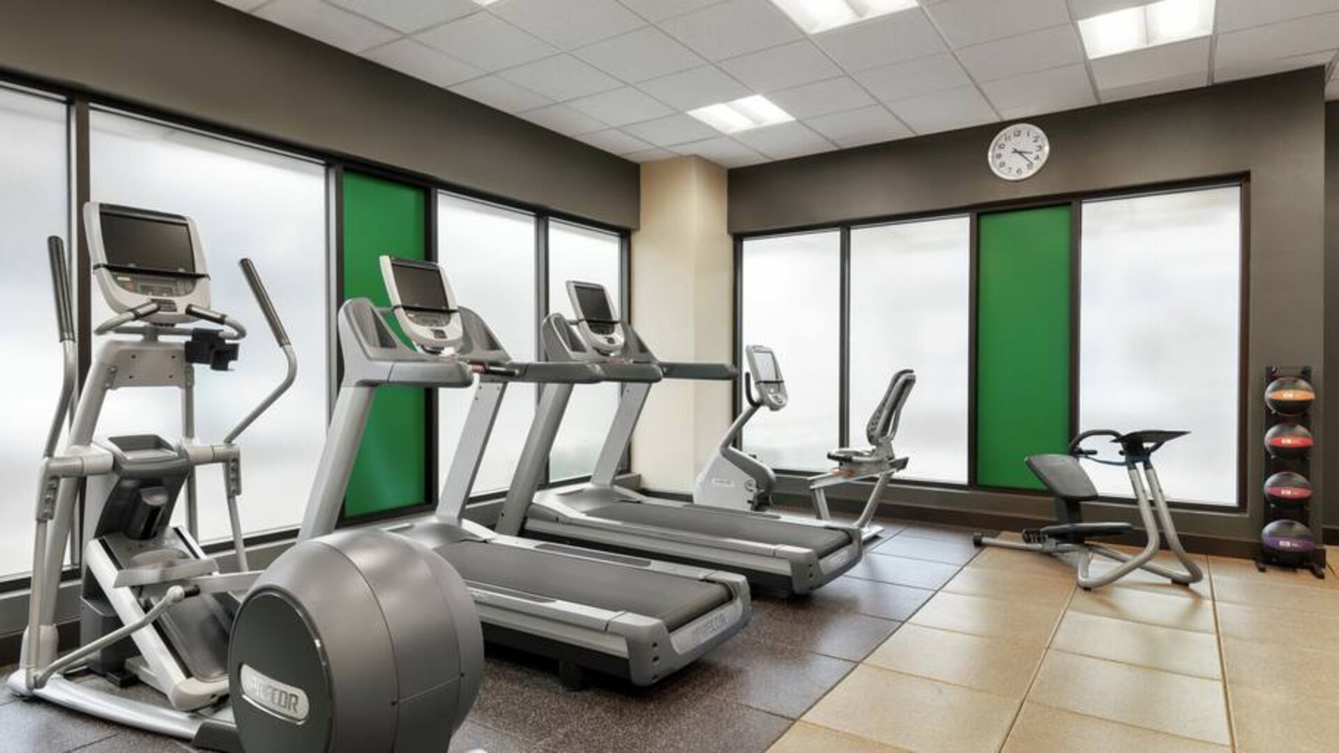 Fully equipped fitness center at the Embassy Suites by Hilton Salt Lake City West Valley.