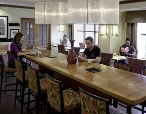 Dining area perfect as workspace at the Hampton Inn Springfield South Enfield.