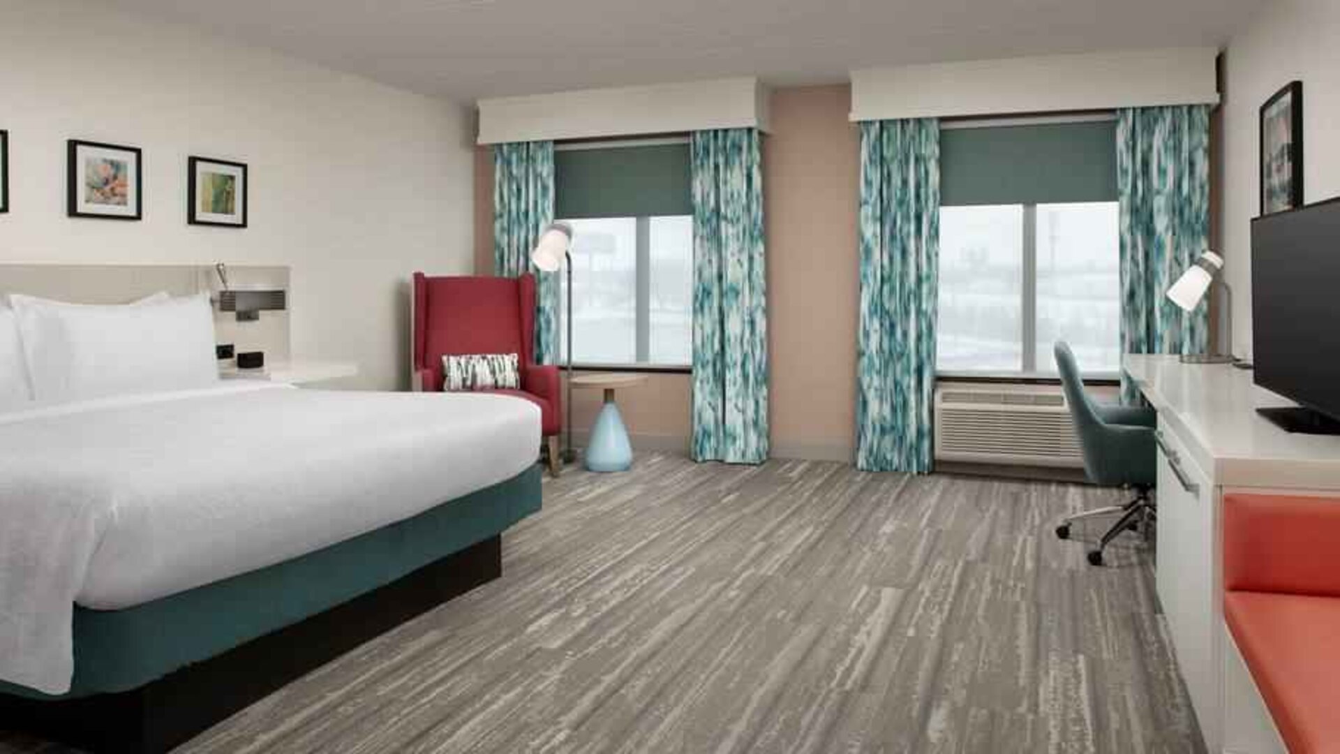 Spacious king guestroom with working station at the Hilton Garden Inn Dallas/Duncanville.