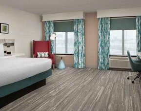 Spacious king guestroom with working station at the Hilton Garden Inn Dallas/Duncanville.