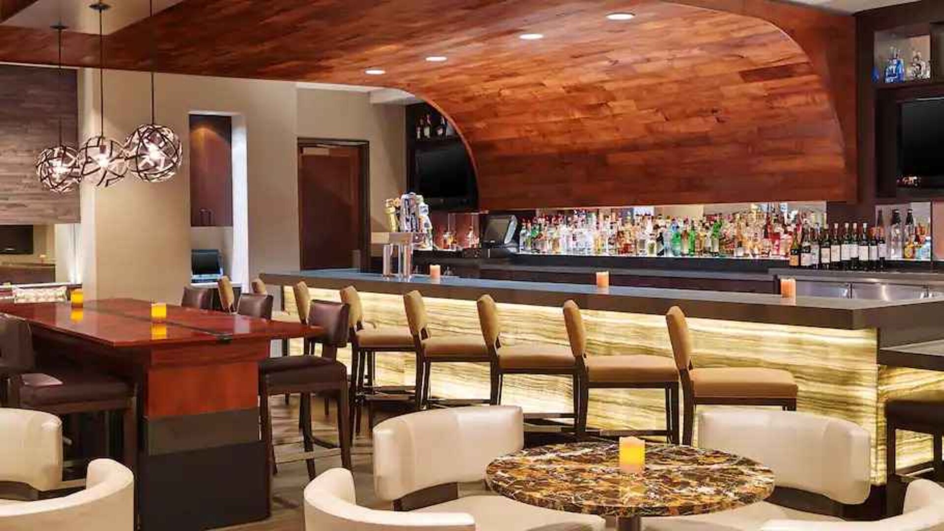 Stylish dining area perfect as workspace at the Hilton San Antonio-Airport.