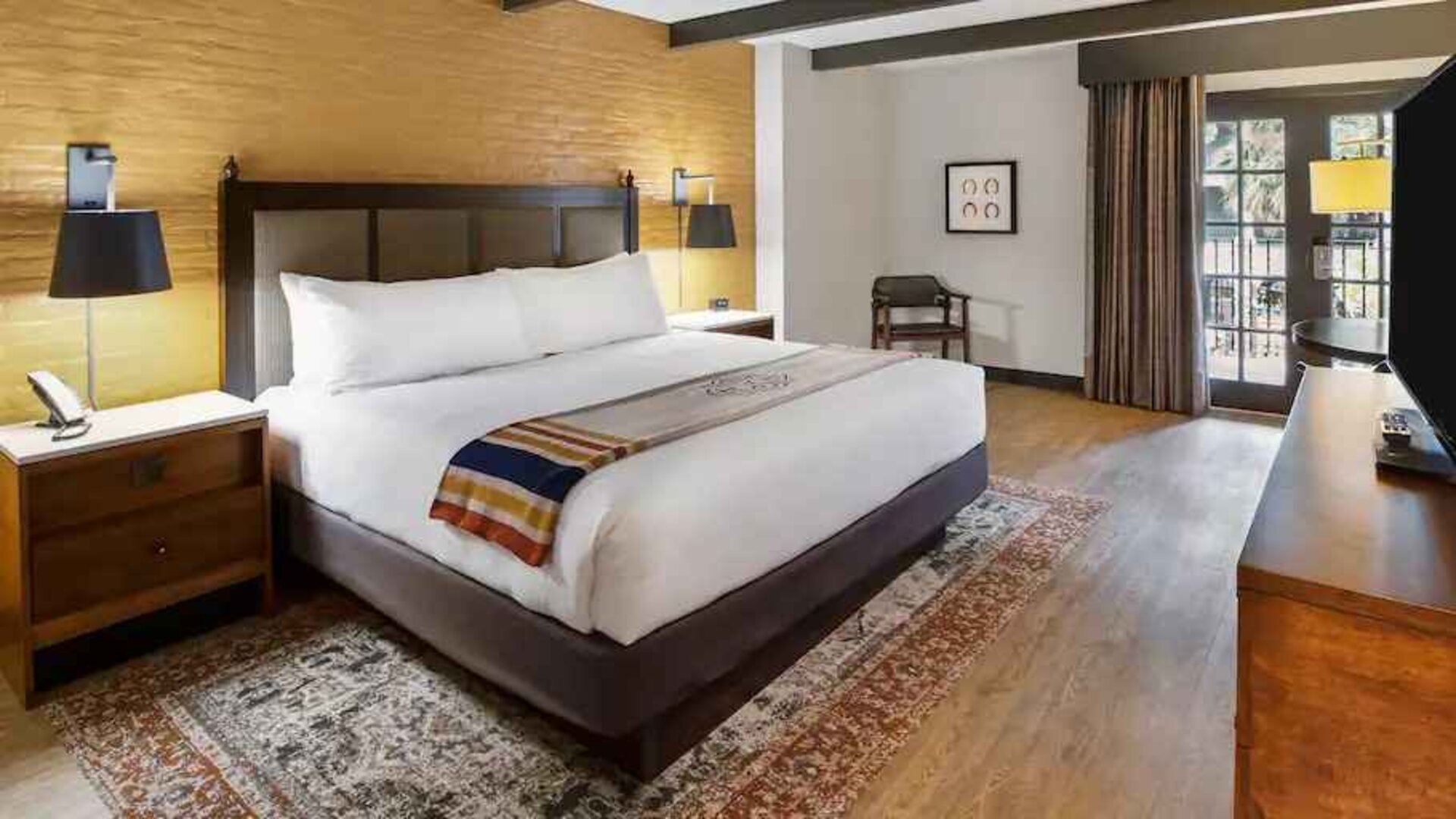 Spacious king bed with work station at The Modern Honolulu.