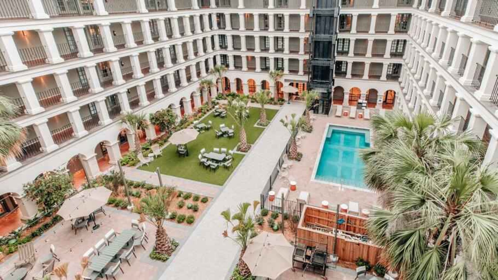 Beautiful outdoor space with pool and garden at the Estancia del Norte San Antonio, Tapestry Collection.