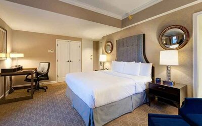 Spacious king room with work desk perfect for remote work at Hilton Milwaukee City Center.