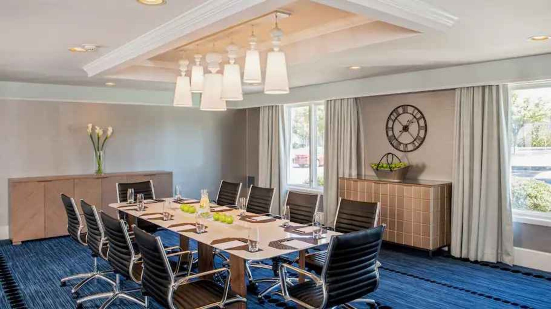 Small meeting room with table and chairs at the Hilton Wilmington-Christiana.