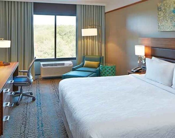 Spacious delux king room with TV and work desk and lots of natural light at Hilton Garden Inn Boston/Marlborough.