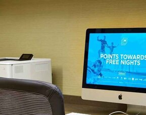 Dedicated business center with printer, computers, and internet at Hilton Garden Inn Boston/Marlborough.