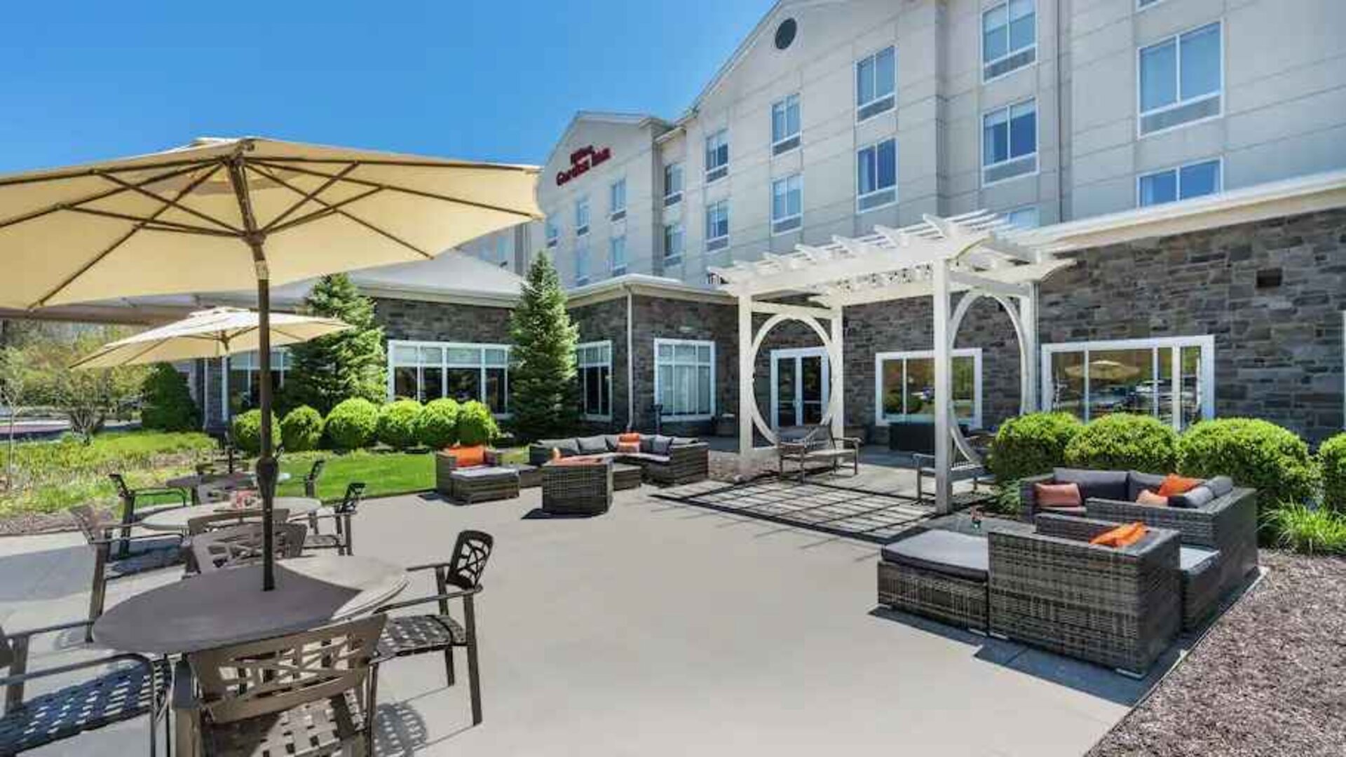 Beautiful outdoor workspace with garden at the Hilton Garden Inn Blacksburg University.