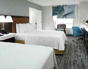 Double queen room with working station at the Hampton Inn & Suites Memphis-Beale Street.