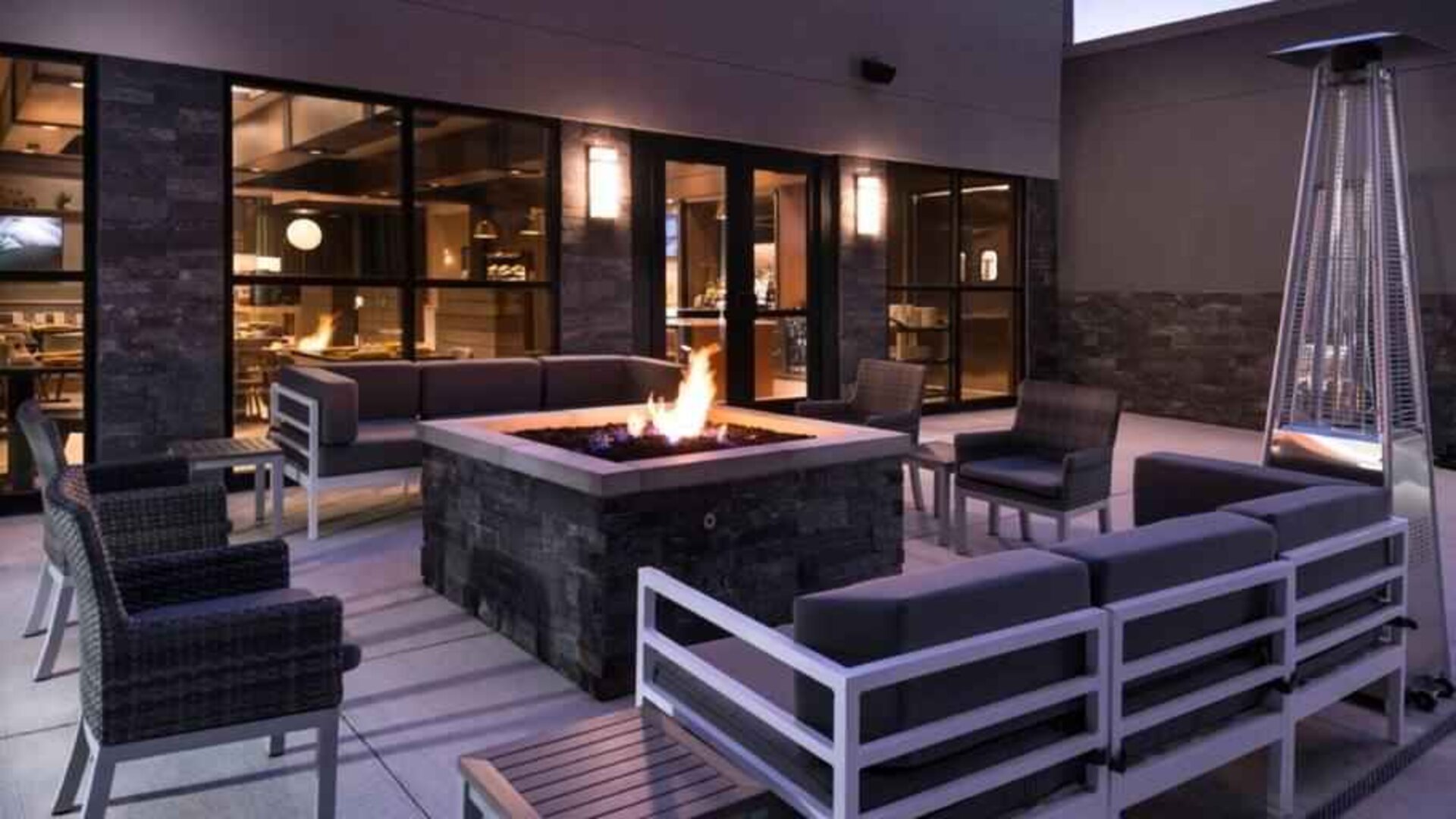 Beautiful outdoor terrace with firepit at the DoubleTree by Hilton Lafayette East.