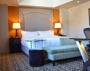Luxurious king room with work area at The Sam Houston, Curio Collection by Hilton.