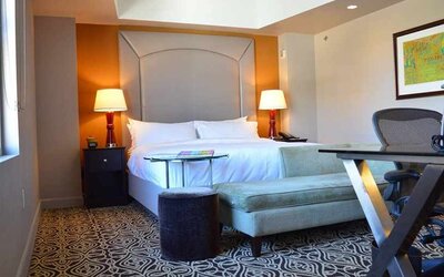 Luxurious king room with work area at The Sam Houston, Curio Collection by Hilton.