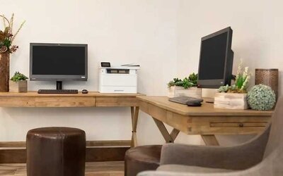 dedicated business center with printers, internet, and work desks ideal for working remotely at Embassy Suites by Hilton Boulder.