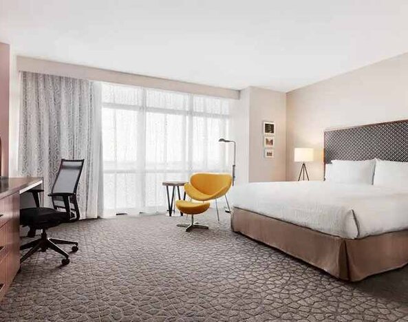 spacious delux king room with TV, work desk and lots of natural light at Hilton Garden Inn Boulder.