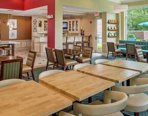 well-lit lobby lounge area ideal for coworking at Hilton Garden Inn St. Louis/O'Fallon MO.
