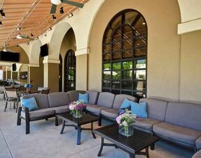 Outdoor workspace perfect for co-working at the Embassy Suites by Hilton Greenville Golf Resort Conference Center